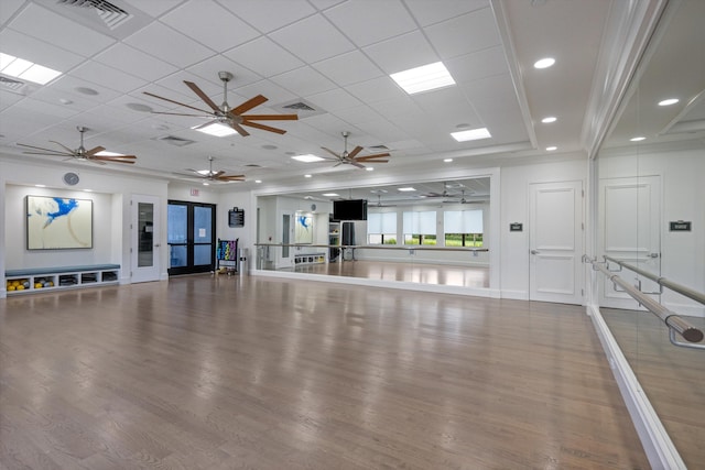 12582 Copper Mountain Pass, Boynton Beach, FL 33473 - workout room with wood finished floors, a ceiling fan, and a paneled ceiling