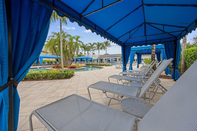 12582 Copper Mountain Pass, Boynton Beach, FL 33473 - view of patio / terrace featuring a gazebo and a community pool