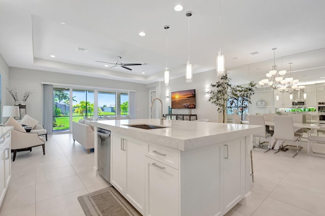 12685 New Caladonia Ln, Boynton Beach, FL 33473 - kitchen featuring open floor plan, a sink, appliances with stainless steel finishes, a raised ceiling, and recessed lighting