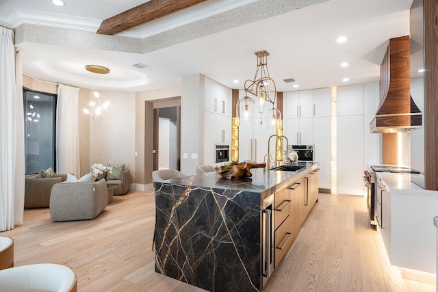 17709 Circle Pond Ct, Boca Raton, FL 33496 - kitchen featuring light wood finished floors, high end stove, modern cabinets, ornamental molding, and island exhaust hood
