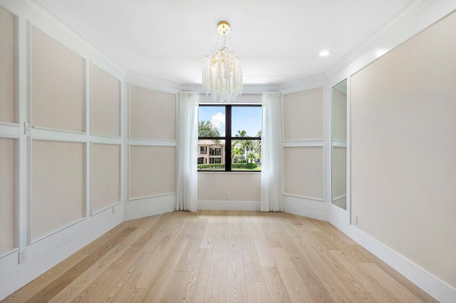 17709 Circle Pond Ct, Boca Raton, FL 33496 - unfurnished room with a chandelier, wood finished floors, crown molding, recessed lighting, and baseboards