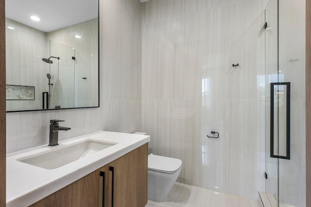 17709 Circle Pond Ct, Boca Raton, FL 33496 - full bath with tile walls, a shower stall, vanity, and toilet