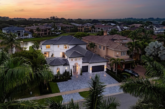 17709 Circle Pond Ct, Boca Raton, FL 33496 - aerial view at dusk of a residential view and a water view