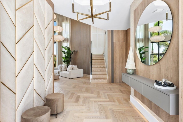 17709 Circle Pond Ct, Boca Raton, FL 33496 - entrance foyer with a raised ceiling, a chandelier, and french doors