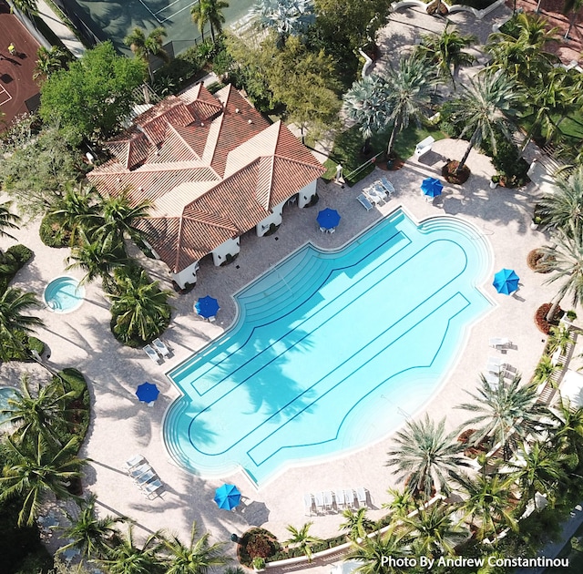 17709 Circle Pond Ct, Boca Raton, FL 33496 - gym featuring a tray ceiling, baseboards, and a drop ceiling