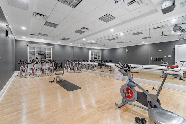 17709 Circle Pond Ct, Boca Raton, FL 33496 - workout area featuring wood finished floors, a paneled ceiling, and baseboards