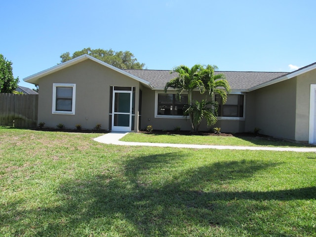 648 NE Maranta Terrado, Jensen Beach, FL 34957 - ranch-style house featuring stucco siding and a shingled roof