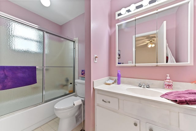 109 Lake Rebecca Dr Unit 109, West Palm Beach, FL 33411 - bathroom with vanity, enclosed tub / shower combo, tile patterned floors, and a ceiling fan