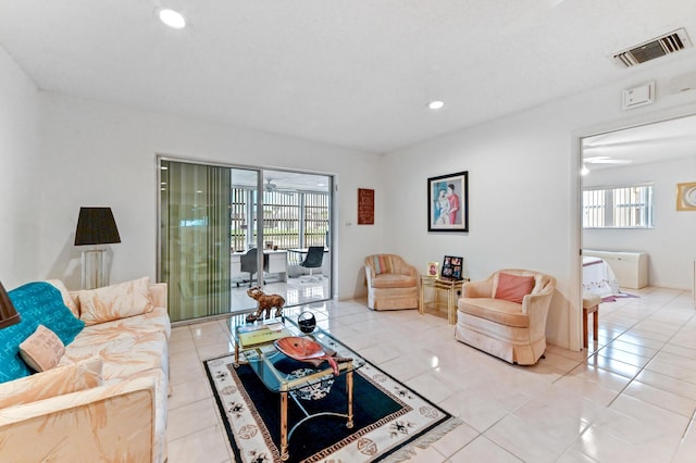 109 Lake Rebecca Dr Unit 109, West Palm Beach, FL 33411 - living room featuring recessed lighting and light tile patterned floors