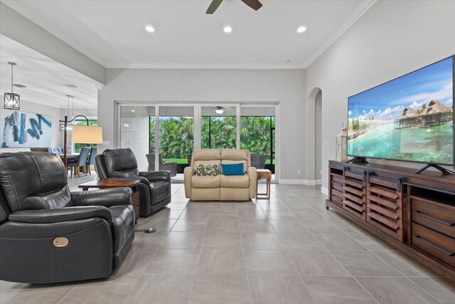 8369 Paladin Sq, Vero Beach, FL 32967 - living area with ceiling fan, crown molding, arched walkways, recessed lighting, and light tile patterned floors