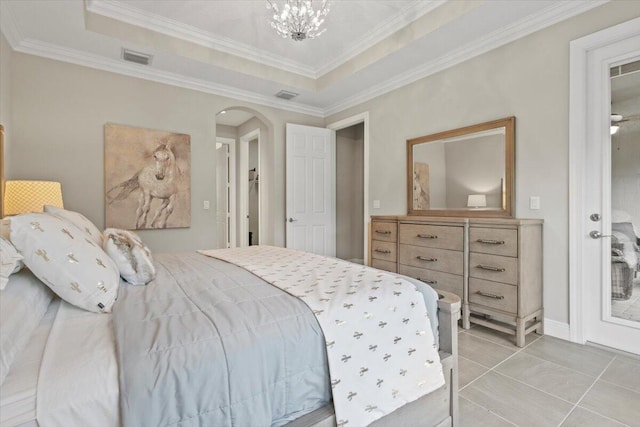 8369 Paladin Sq, Vero Beach, FL 32967 - bedroom with arched walkways, ornamental molding, a raised ceiling, light tile patterned floors, and a chandelier