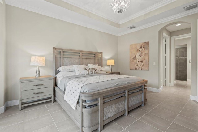 8369 Paladin Sq, Vero Beach, FL 32967 - bedroom with tile patterned floors, arched walkways, baseboards, crown molding, and a chandelier