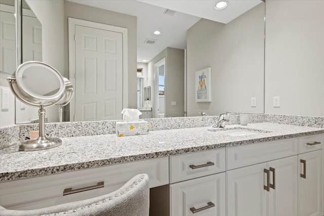 8369 Paladin Sq, Vero Beach, FL 32967 - bathroom with vanity and recessed lighting