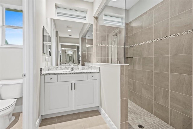 8369 Paladin Sq, Vero Beach, FL 32967 - full bath with toilet, walk in shower, vanity, and plenty of natural light