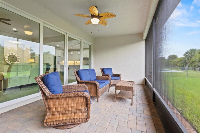 8369 Paladin Sq, Vero Beach, FL 32967 - sunroom featuring a ceiling fan