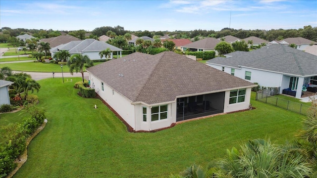 8369 Paladin Sq, Vero Beach, FL 32967 - rear view of house with roof with shingles, a residential view, and stucco siding