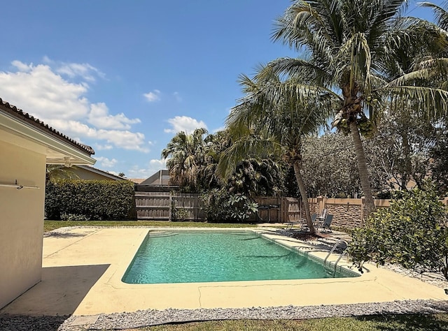 1807 Crafton Rd, North Palm Beach, FL 33408 - view of swimming pool with a fenced backyard and a patio