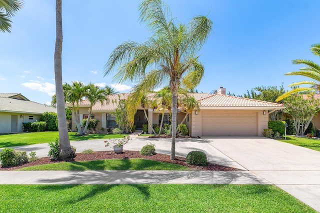 11700 Island Lakes Ln, Boca Raton, FL 33498 - mediterranean / spanish-style home with a tile roof, stucco siding, curved driveway, a chimney, and an attached garage