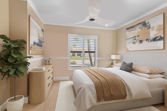 11700 Island Lakes Ln, Boca Raton, FL 33498 - bedroom featuring ornamental molding, light wood-type flooring, and baseboards