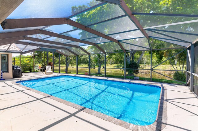 11700 Island Lakes Ln, Boca Raton, FL 33498 - swimming pool with a patio area and a lanai