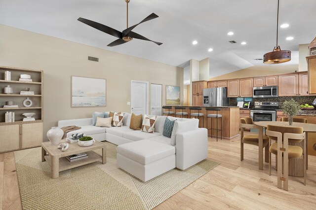 11700 Island Lakes Ln, Boca Raton, FL 33498 - living room with vaulted ceiling, light wood-type flooring, ceiling fan, and recessed lighting