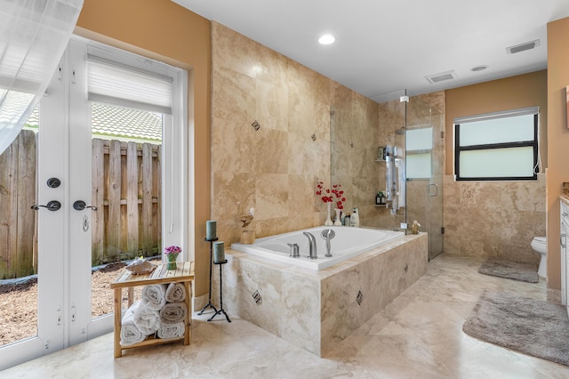 11700 Island Lakes Ln, Boca Raton, FL 33498 - bathroom featuring a shower stall, a bath, and toilet