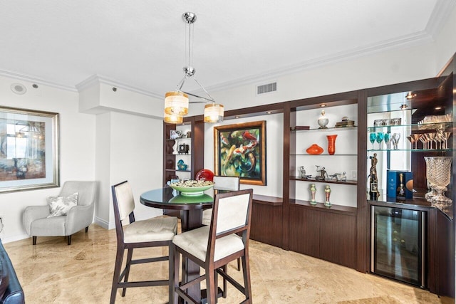 3740 S Ocean Blvd Unit 403, Highland Beach, FL 33487 - dining room with wine cooler, crown molding, and a dry bar