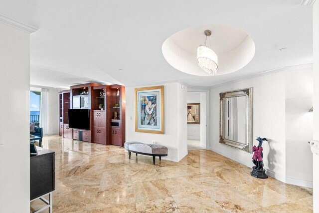 3740 S Ocean Blvd Unit 403, Highland Beach, FL 33487 - corridor featuring marble tiled floors, ornamental molding, and baseboards