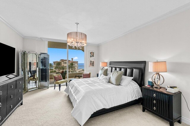 3740 S Ocean Blvd Unit 403, Highland Beach, FL 33487 - bedroom with a chandelier, light carpet, ornamental molding, access to outside, and a wall of windows