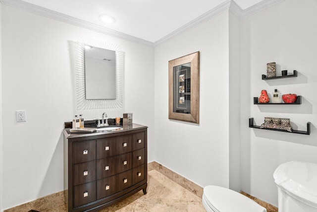 3740 S Ocean Blvd Unit 403, Highland Beach, FL 33487 - half bath featuring toilet, crown molding, vanity, and baseboards