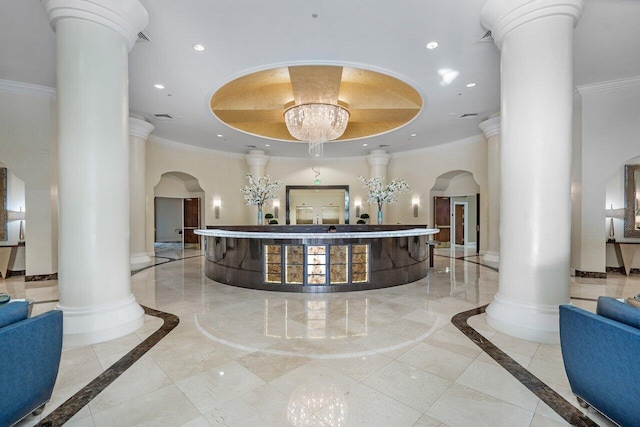 3740 S Ocean Blvd Unit 403, Highland Beach, FL 33487 - welcome area with ornate columns, arched walkways, recessed lighting, ornamental molding, and a chandelier