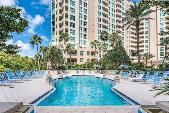 3740 S Ocean Blvd Unit 403, Highland Beach, FL 33487 - community pool with a patio area and fence