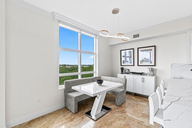 3740 S Ocean Blvd Unit 403, Highland Beach, FL 33487 - dining room featuring crown molding, baseboards, a chandelier, and light marble finish flooring