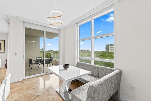 3740 S Ocean Blvd Unit 403, Highland Beach, FL 33487 - dining space with baseboards and a chandelier