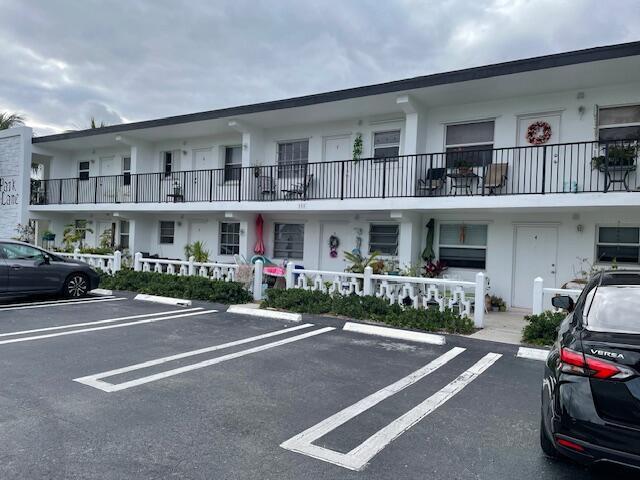 111 SE 1st St Unit 7, Boynton Beach, FL 33435 - view of property with uncovered parking