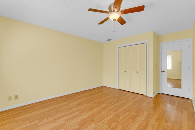 10109 45th Trl S, Boynton Beach, FL 33436 - unfurnished bedroom with light wood-style floors, baseboards, and a closet