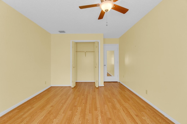 10109 45th Trl S, Boynton Beach, FL 33436 - unfurnished bedroom with light wood-style floors, baseboards, a closet, and ceiling fan