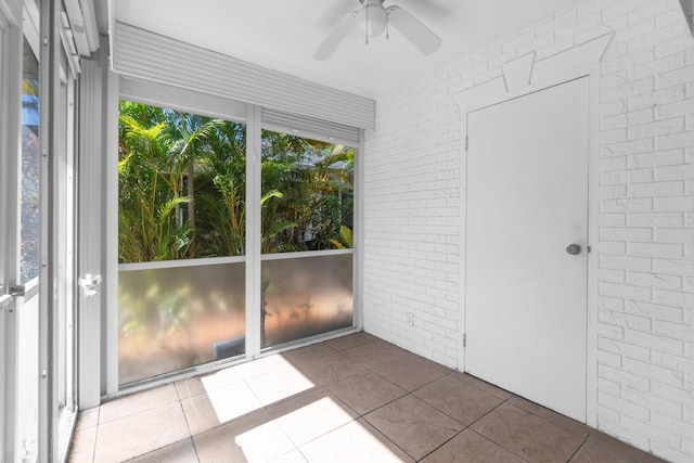 10109 45th Trl S, Boynton Beach, FL 33436 - unfurnished sunroom featuring a ceiling fan