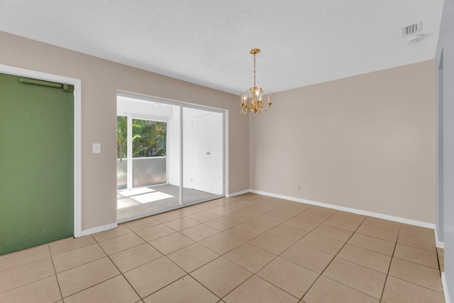 10109 45th Trl S, Boynton Beach, FL 33436 - unfurnished room with a chandelier, light tile patterned floors, baseboards, and a textured ceiling