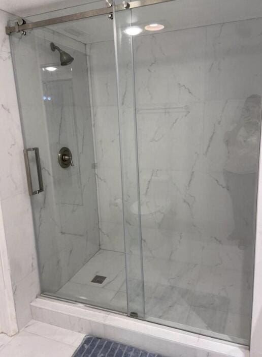 7844 La Mirada Dr, Boca Raton, FL 33433 - bathroom with a marble finish shower