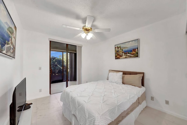 7844 La Mirada Dr, Boca Raton, FL 33433 - bedroom featuring access to exterior, ceiling fan, light marble finish flooring, baseboards, and a textured ceiling