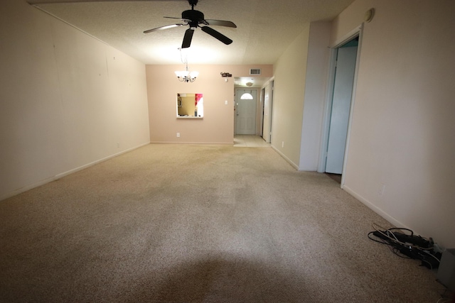 7955 NW 5th Ct Unit 103, Margate, FL 33063 - empty room featuring a ceiling fan, light carpet, baseboards, and a textured ceiling