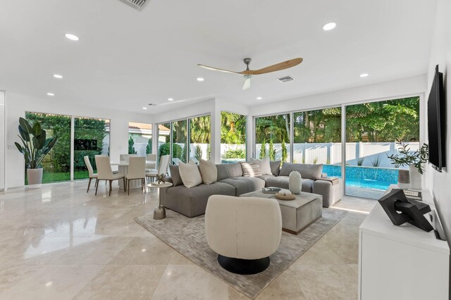 2646 NW 49th St, Boca Raton, FL 33434 - living area featuring plenty of natural light, recessed lighting, ceiling fan, and light marble finish floors