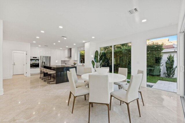 2646 NW 49th St, Boca Raton, FL 33434 - dining room featuring light marble finish floors and recessed lighting