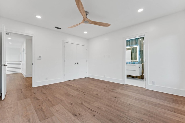 2646 NW 49th St, Boca Raton, FL 33434 - unfurnished bedroom with wood finished floors, recessed lighting, baseboards, ensuite bath, and a ceiling fan