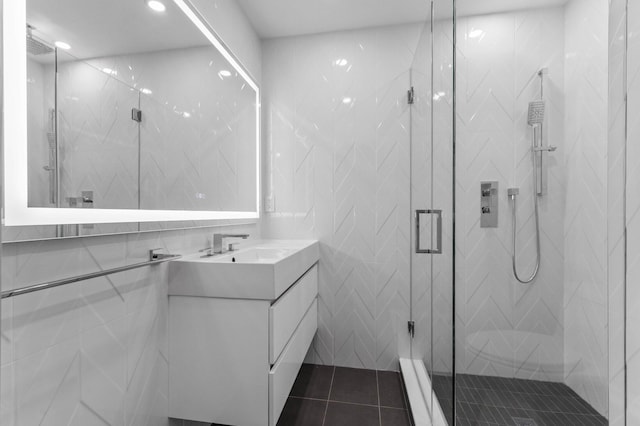 2646 NW 49th St, Boca Raton, FL 33434 - full bath featuring a marble finish shower, vanity, recessed lighting, tile walls, and tile patterned floors