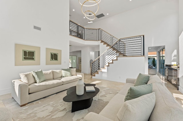 2646 NW 49th St, Boca Raton, FL 33434 - living room featuring a towering ceiling, stairs, recessed lighting, and baseboards