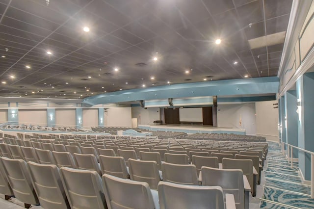 home theater room featuring carpet and recessed lighting
