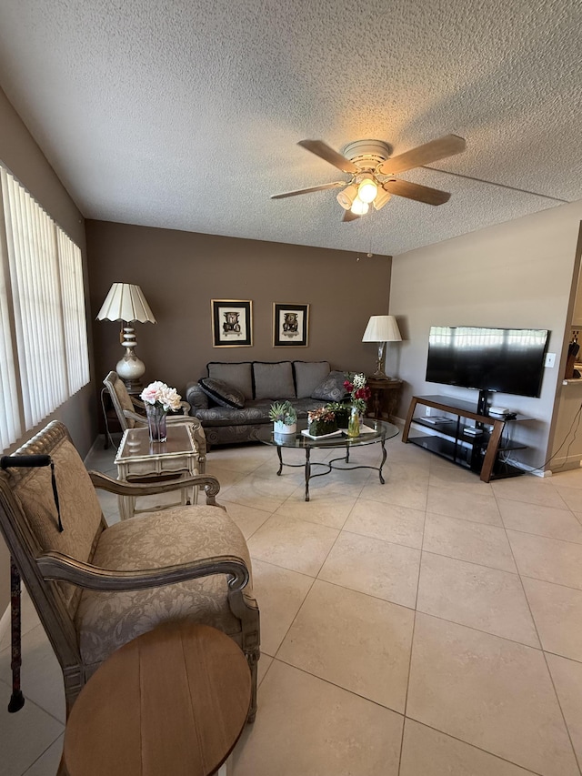 1008 Wolverton A, Boca Raton, FL 33434 - tiled living area featuring a textured ceiling and ceiling fan