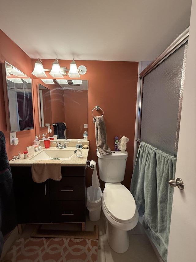 1008 Wolverton A, Boca Raton, FL 33434 - bathroom with vanity, toilet, and an enclosed shower
